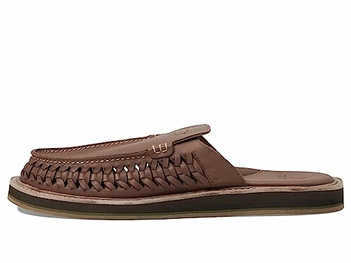 Brown leather slip-on shoe with woven design and flat sole.