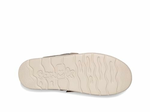 Bottom view of a sandal sole with a wavy pattern and logo.