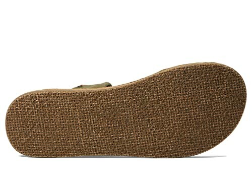 Textured sole of a shoe on white background